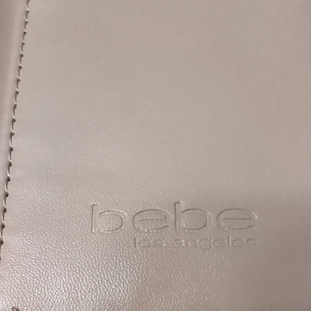 bebe Tan Quilted Clutch Wristlet